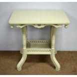 An Edwardian rectangular two tier occasional table