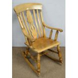 A late 19th century beech and fruitwood rustic Windsor style rocking armchair