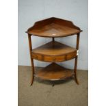 A 19th Century mahogany three-tier corner washstand,