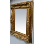 A Victorian style gold painted mirror