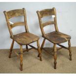 A pair of Victorian rustic beech and elm solid seat kitchen chairs,