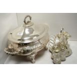 An impressive silver plated oval soup tureen: together with a silver plated egg cruet.