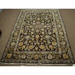 A Kashan rug.