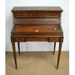 A Louis XVI style mahogany and metal mounted cylinder bureau de dame,