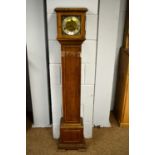 A mid 20th century oak grandmother clock by Elliott