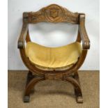 A 20th century beechwood Savonarola/X-frame chair.