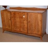 A mid 20th Century banded light mahogany sideboard.