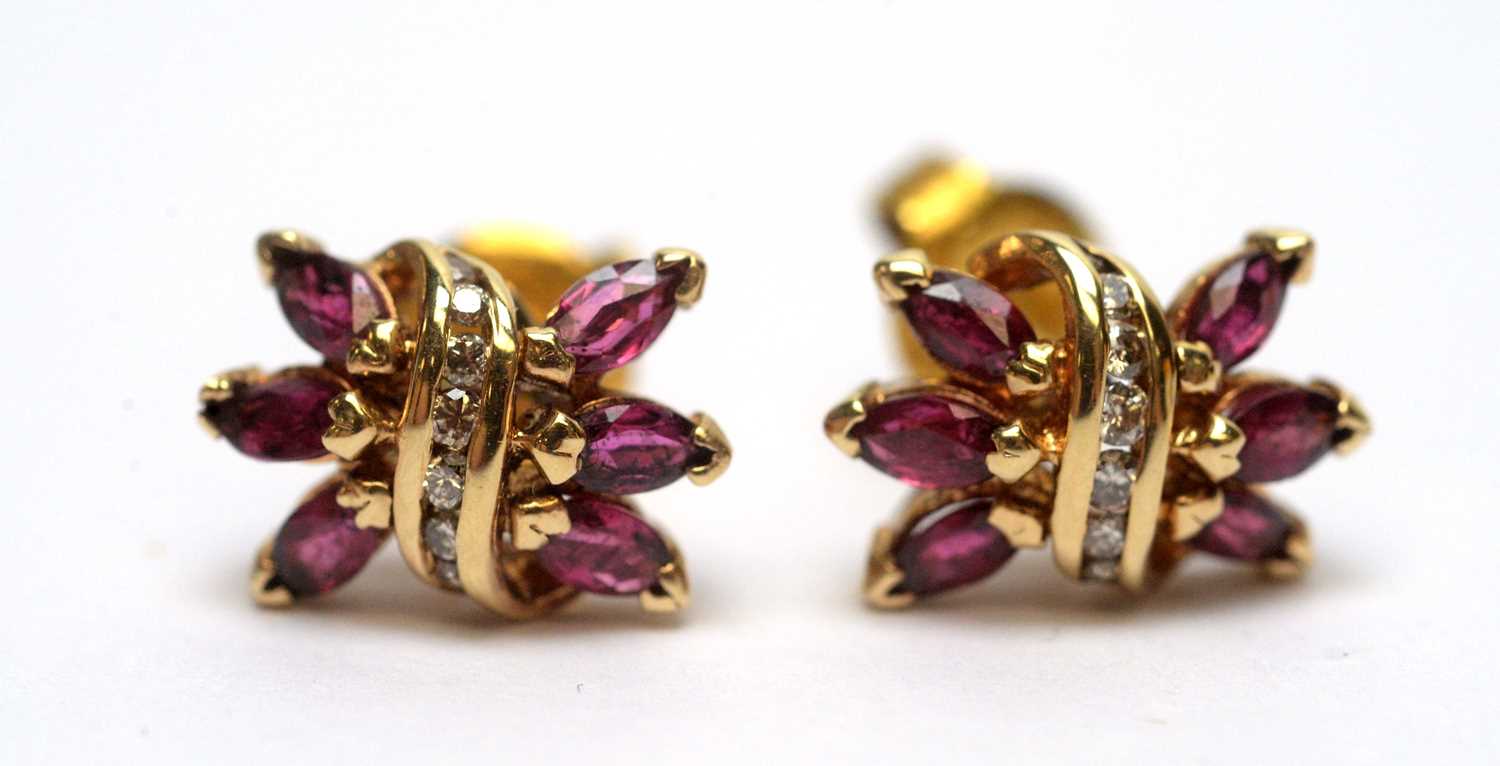 A pair of ruby and diamond earrings,