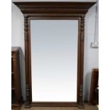 An substantial early 20th century carved oak overmantel mirror.