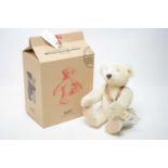 A Steiff anniversary white mohair teddy bear.