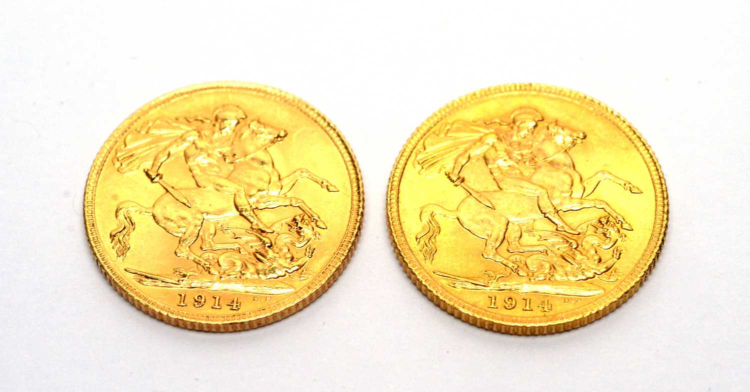 Two George V gold sovereigns,