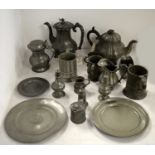 A collection of antique domestic pewter.