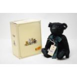 A Steiff limited edition musical teddy bear.