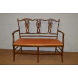 An early 20th Century mahogany parlour settee.