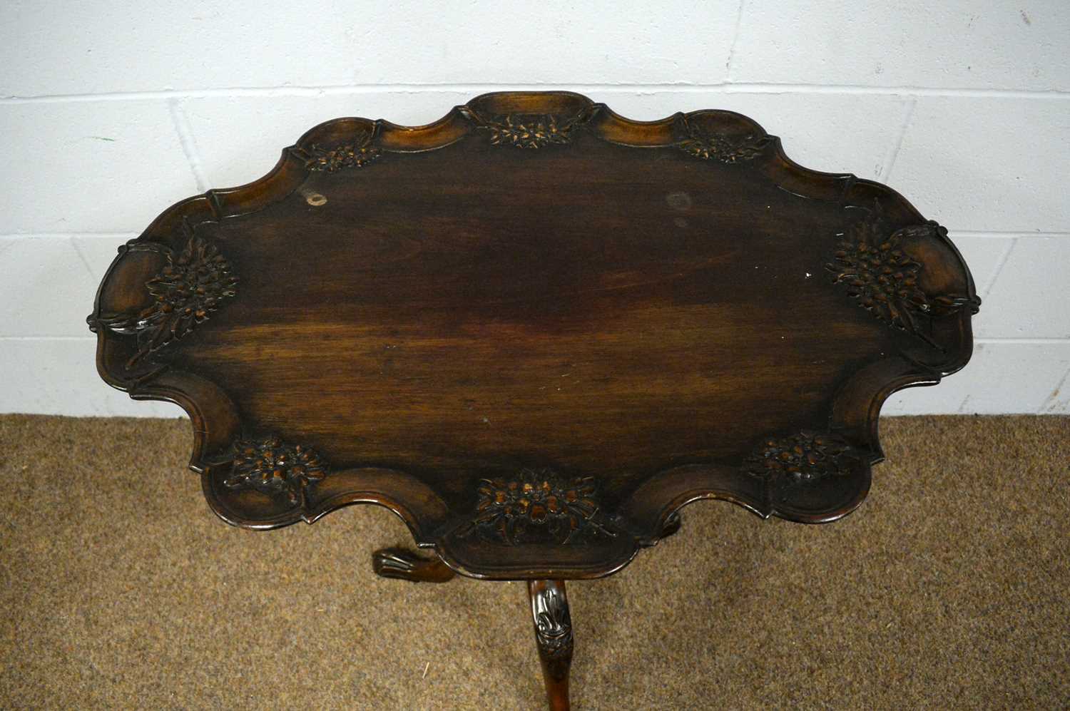 A Victorian-style carved mahogany tilt action tripod table. - Image 2 of 3