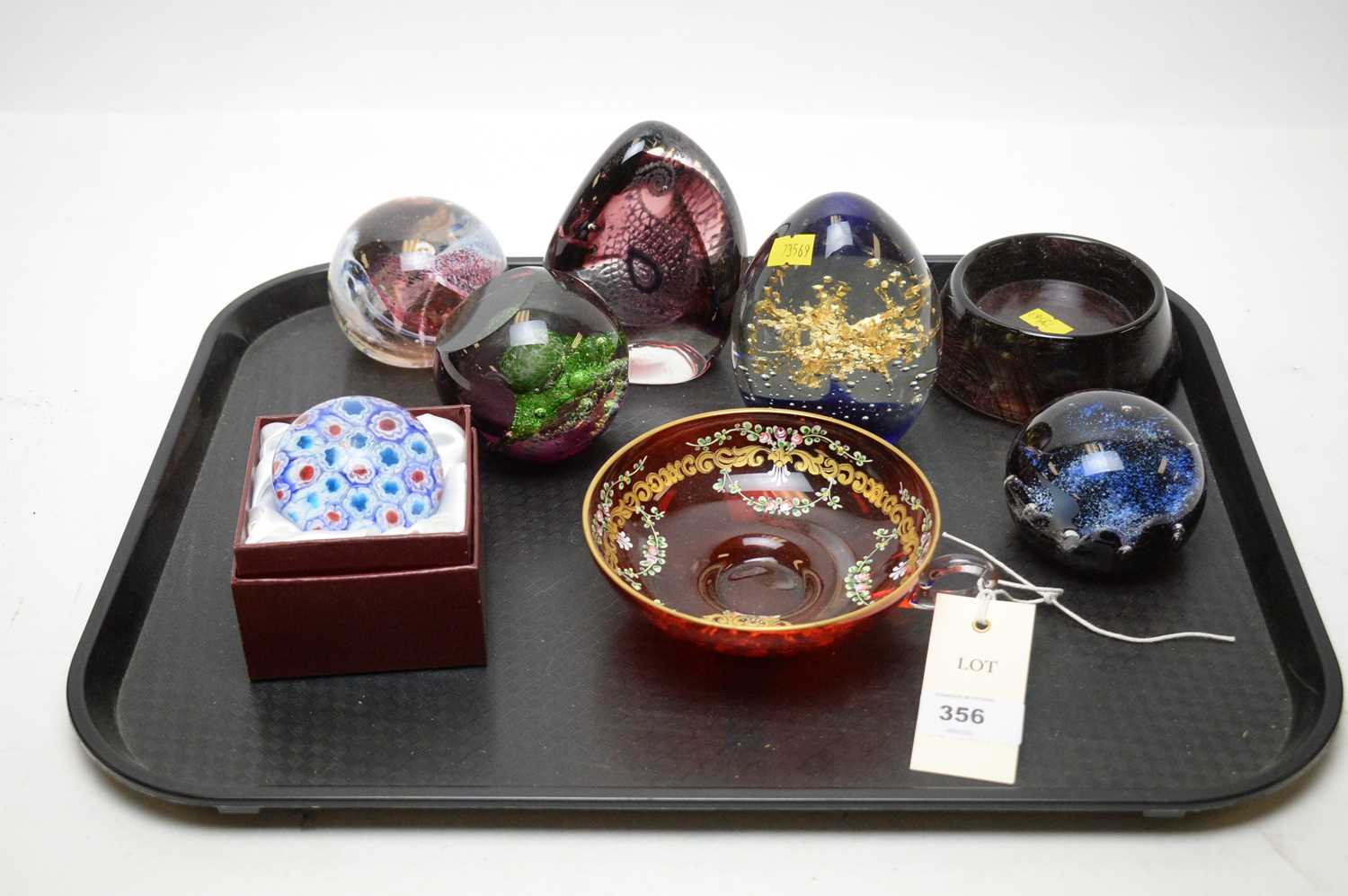 A selection of art glass paperweights.