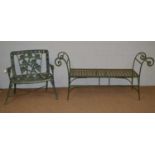 Two green painted cast iron garden benches.