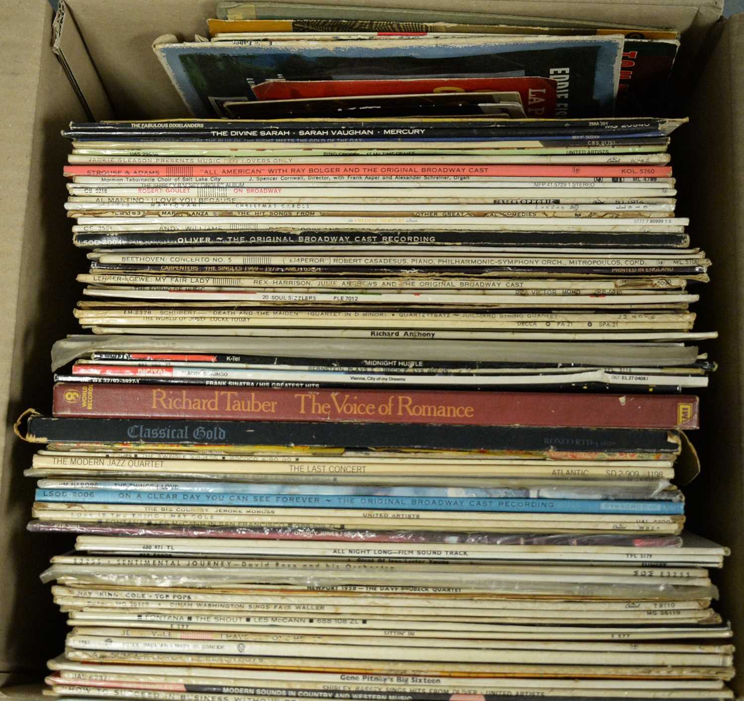 A selection of assorted vinyl LPs.