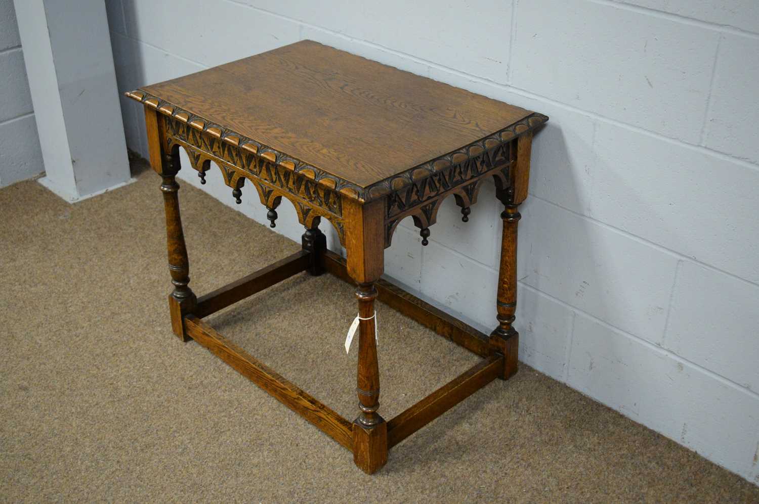 A late 19th Century carved oak table. - Image 2 of 4