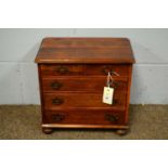 A Victorian-style mahogany apprentice chest of drawers.