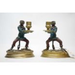 A pair of bronze chamber candlesticks.