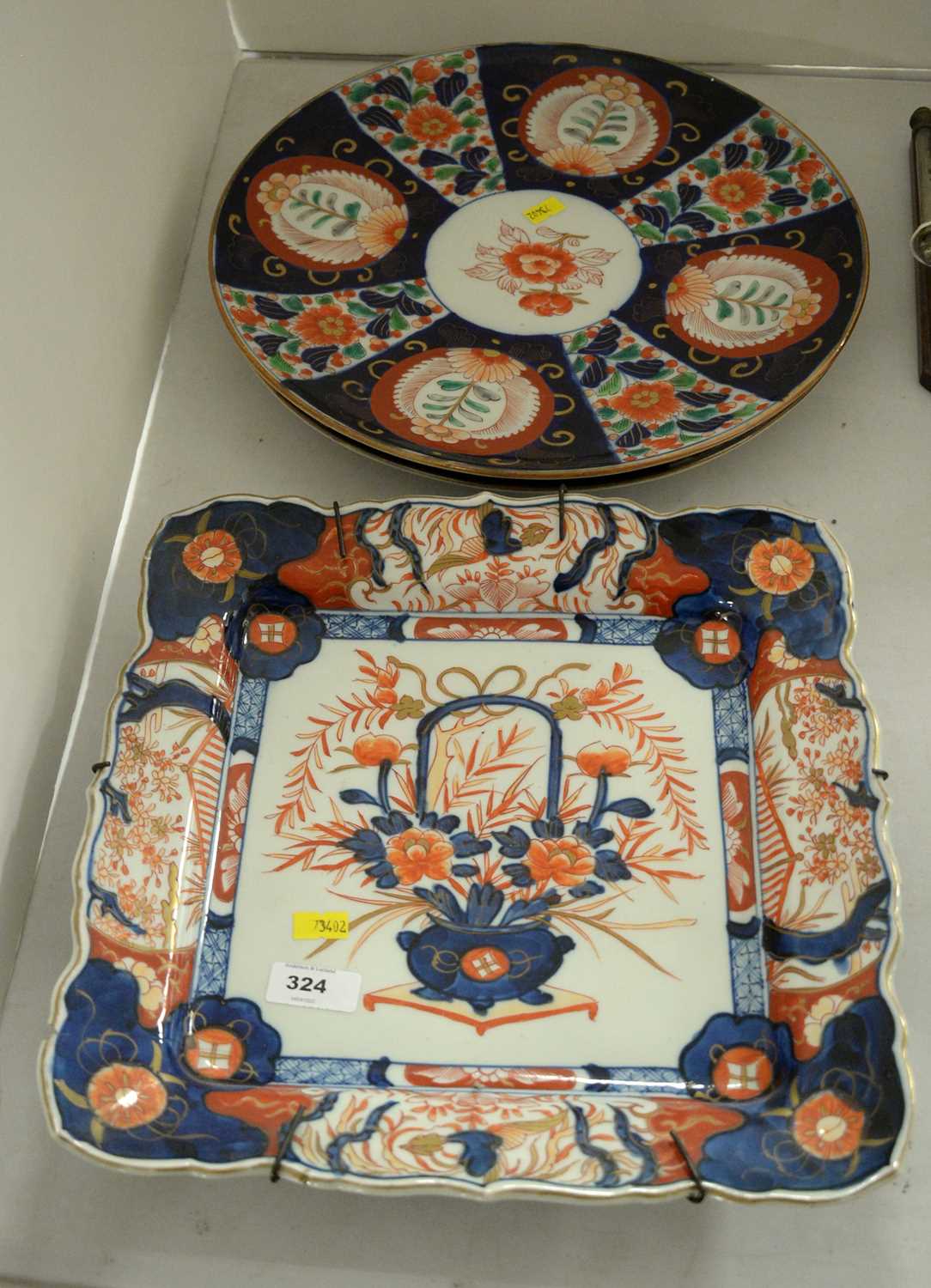 One pair and one single Japanese Imari chargers.