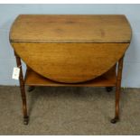 An unusual Victorian mahogany drop leaf drinks table.