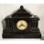 A 19th Century style German ebonised wood mantel clock.