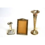 Silver vase, candlestick and photo frame.