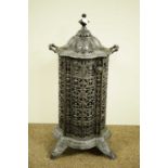 A Victorian cast metal cathedral heater.