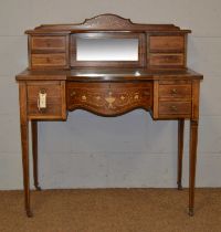 An Edwardian marquetry inlaid rosewood writing desk, by Maple & Co.