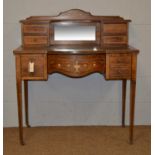 An Edwardian marquetry inlaid rosewood writing desk, by Maple & Co.