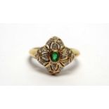 An emerald and diamond ring,