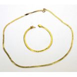 A 14ct yellow gold necklace and bracelet,