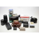 A selection of vintage cameras and accessories.