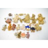 A collection of miniature collectors' teddy bears.