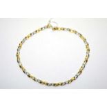 A 14ct yellow and white gold necklace,