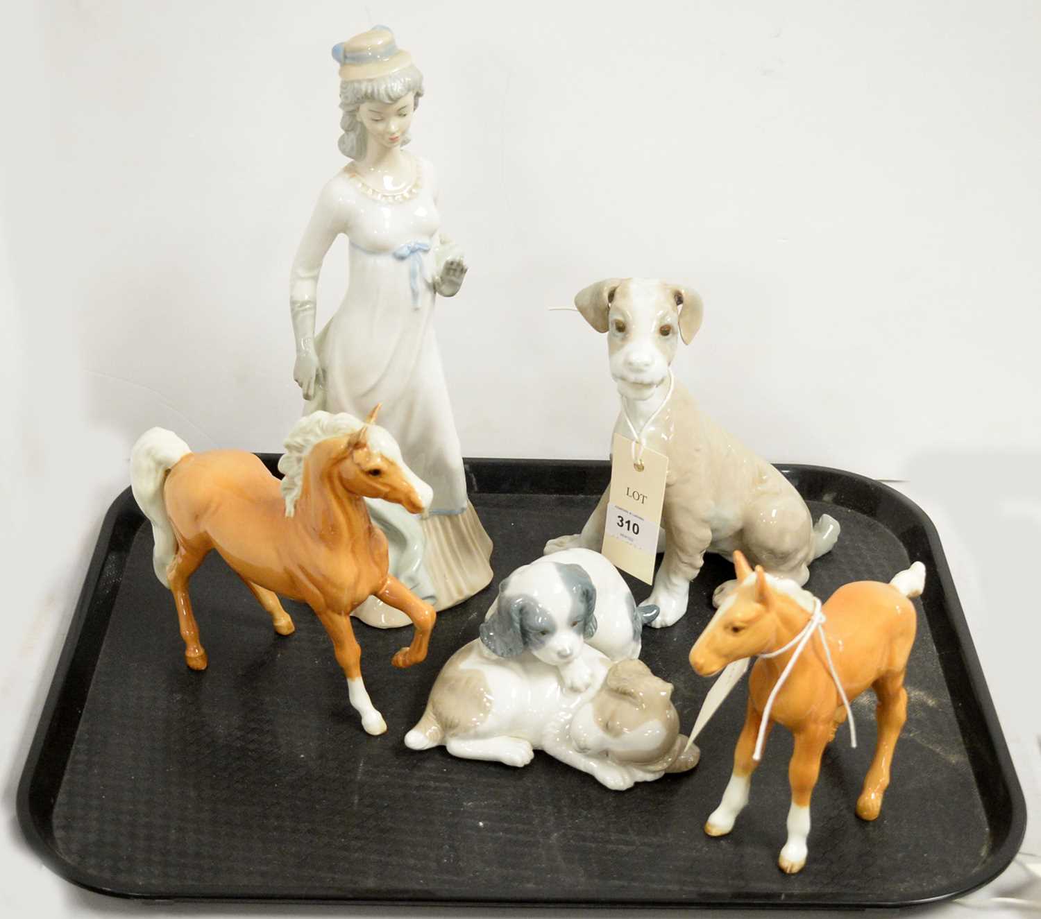 A selection of decorative ceramic figures.