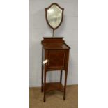 An Edwardian mahogany and satinwood banded shaving stand.