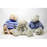 A collection of three All Bear teddy bears.