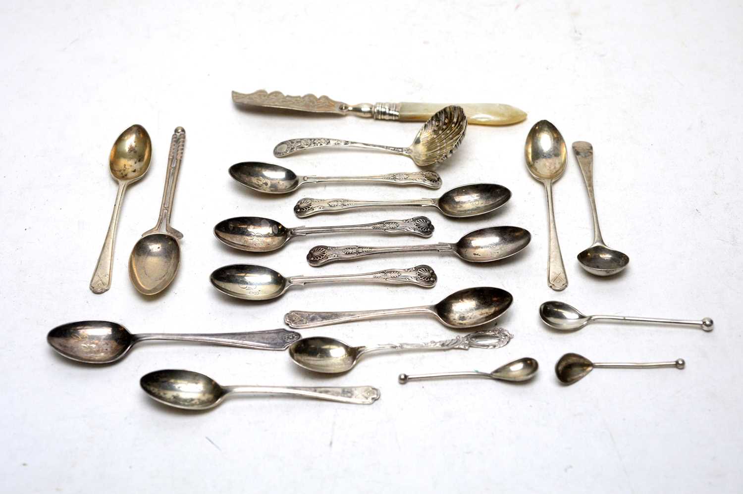 A selection of silver tea and coffee spoons, and a butter knife