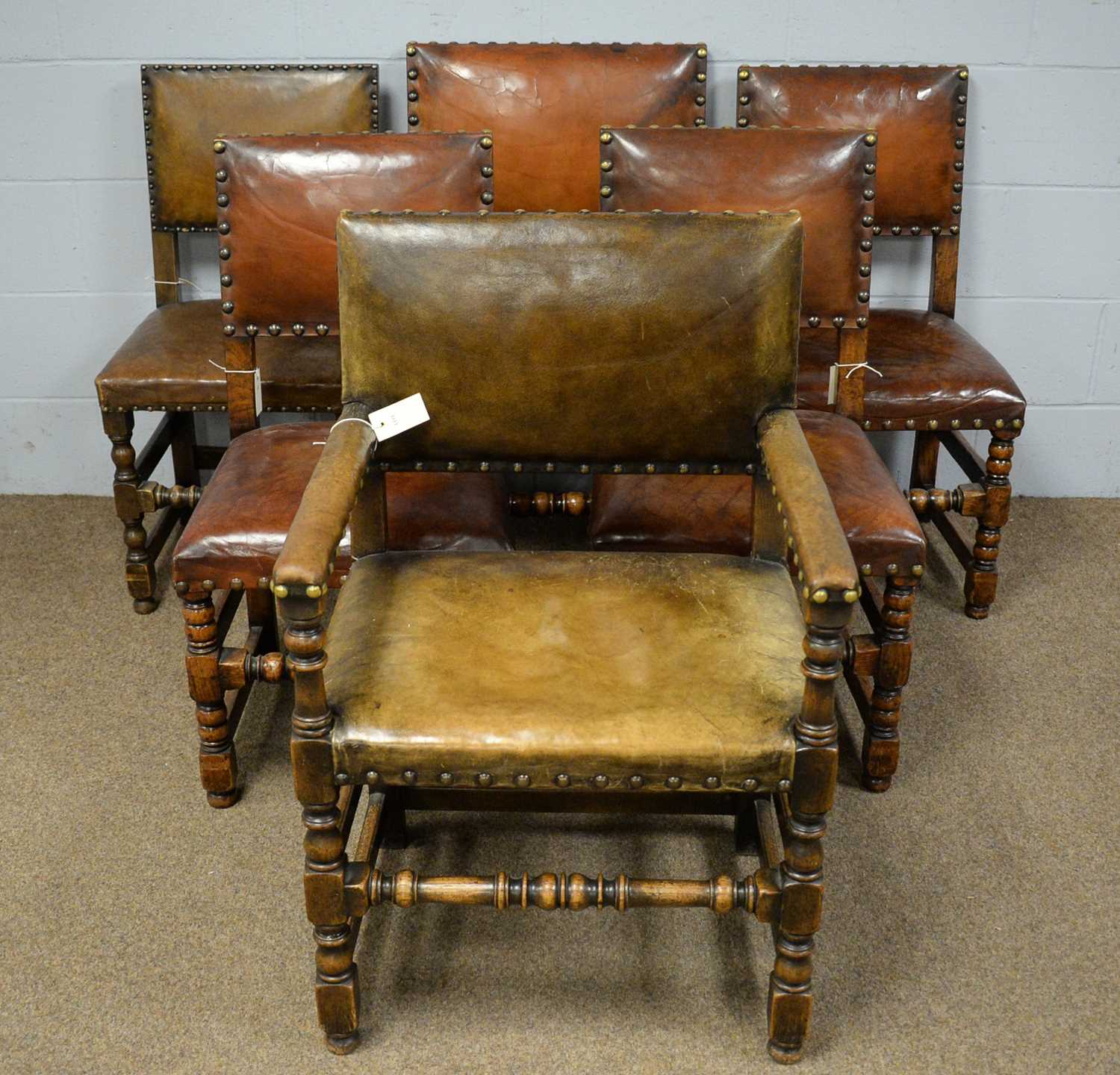 A Harlequin set of six Carolean style dining chairs.