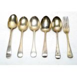 Five silver dessert spoons and a fork,