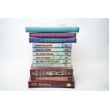 A collection of Folio Society books.