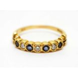 A sapphire and diamond half hoop eternity ring,