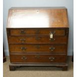 An Georgian oak and mahogany banded bureau