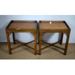 A pair of substantial mahogany occasional tables.