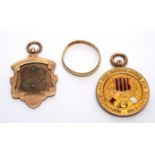 Two gold fobs and a wedding ring