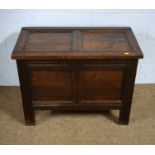 An oak blanket box.