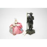 Royal Doulton 'Penelope'; and a carved stone figure.